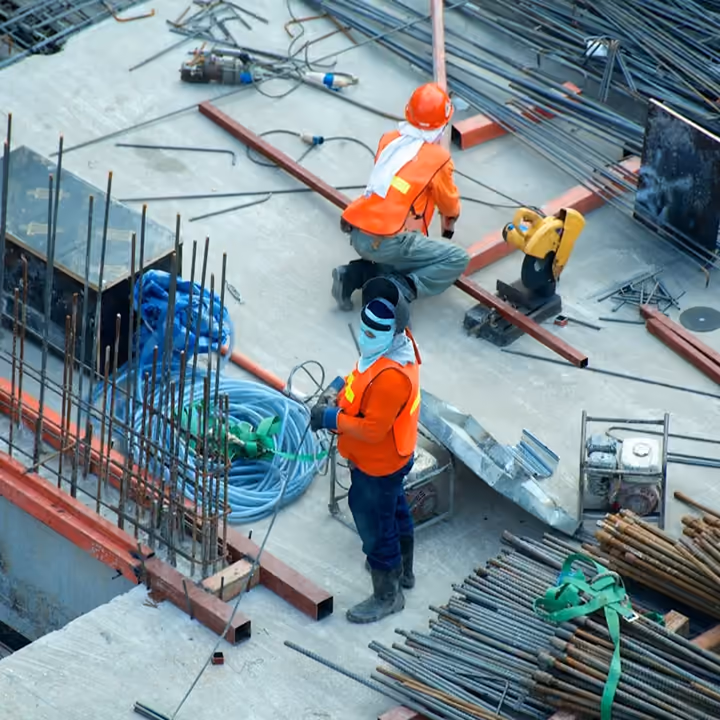 HSE team completing a site inspection in high-visibility gear